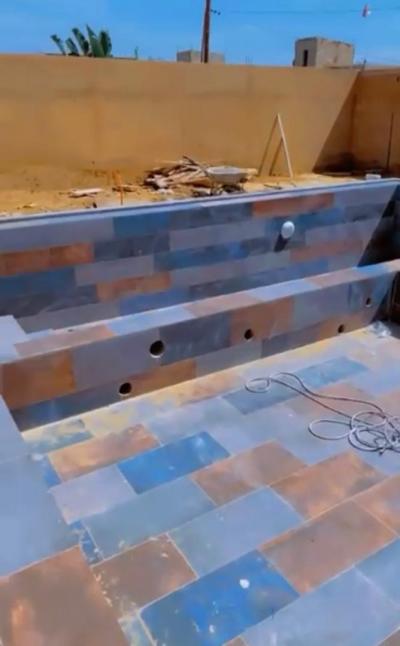 Carreaux pierre Bali piscine 