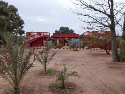 Terrain avec cases à vendre à Warang Sénégal